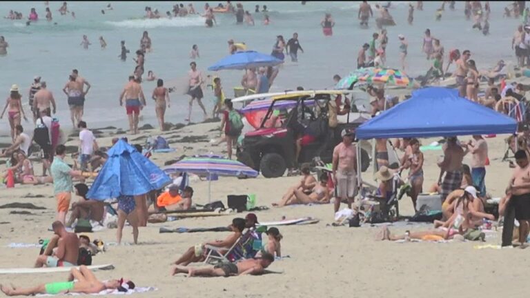 Massive crowds flock to San Diego beaches amid record breaking heat